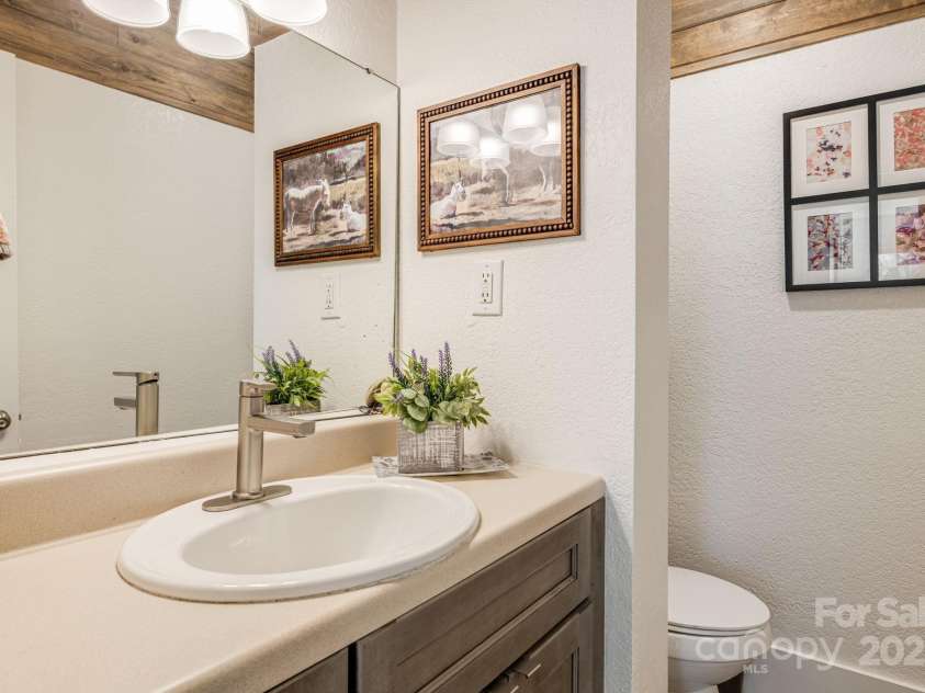 129 Finney Lane, Mars Hill, NC 28754.  MLS# CAR4243744, YatesRealty ID 10915. Guest half bathroom.
