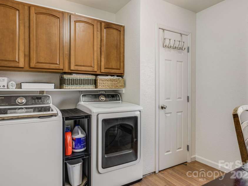 129 Finney Lane, Mars Hill, NC 28754.  MLS# CAR4243744, YatesRealty ID 10915. Main level laundry/mud room, office nook w/window looking towrds the golf course.