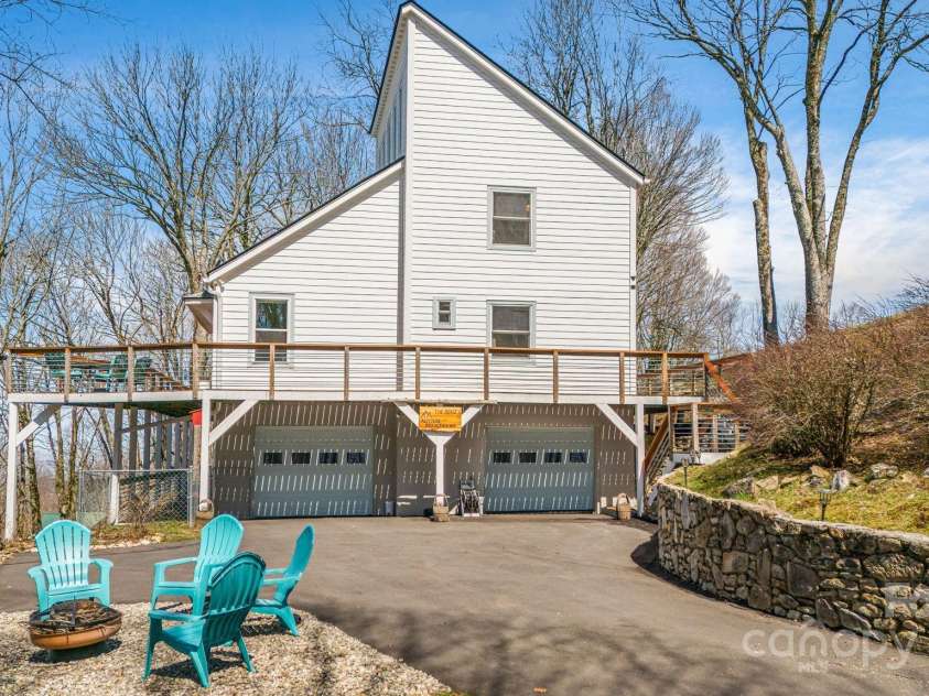 129 Finney Lane, Mars Hill, NC 28754.  MLS# CAR4243744, YatesRealty ID 10915. Newly Paved driveway, 2 car garage with plenty of extra parking and turn around room.