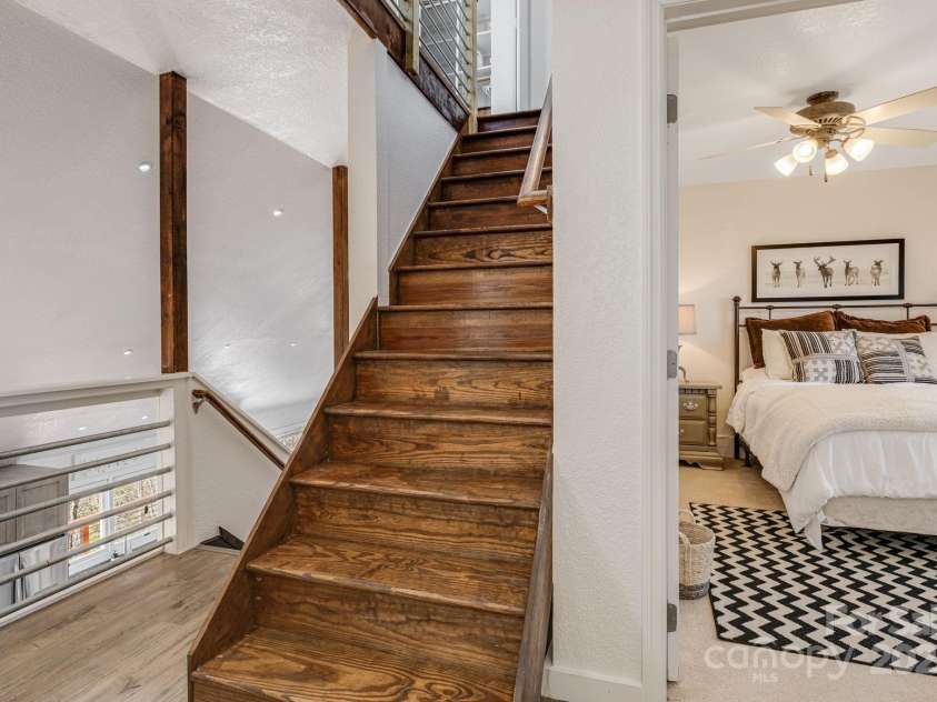 129 Finney Lane, Mars Hill, NC 28754.  MLS# CAR4243744, YatesRealty ID 10915. Stairs to the loft