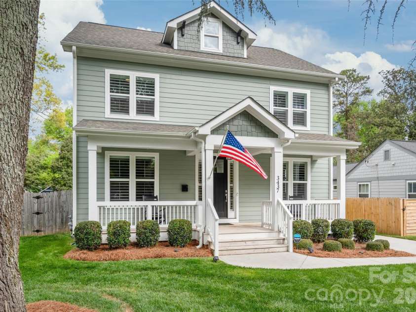 3437 Draper Avenue, Charlotte, NC 28205.  MLS# CAR4364902, YatesRealty ID 10915. Custom-built with durable cement siding and a sprawling front porch made for relaxing.