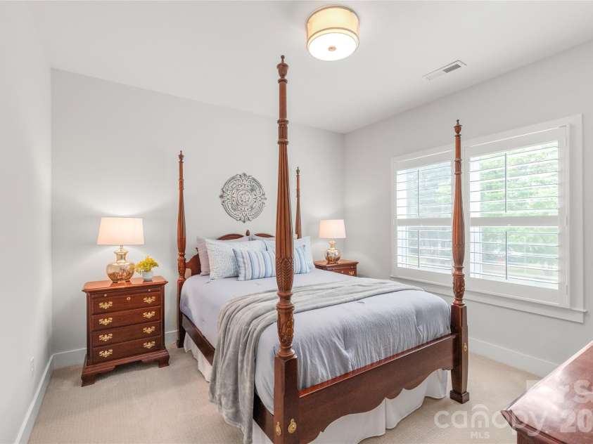 3437 Draper Avenue, Charlotte, NC 28205.  MLS# CAR4364902, YatesRealty ID 10915. Light-filled and versatile. This additional bedroom features classic plantation shutters and ample space for a home office, guest room.