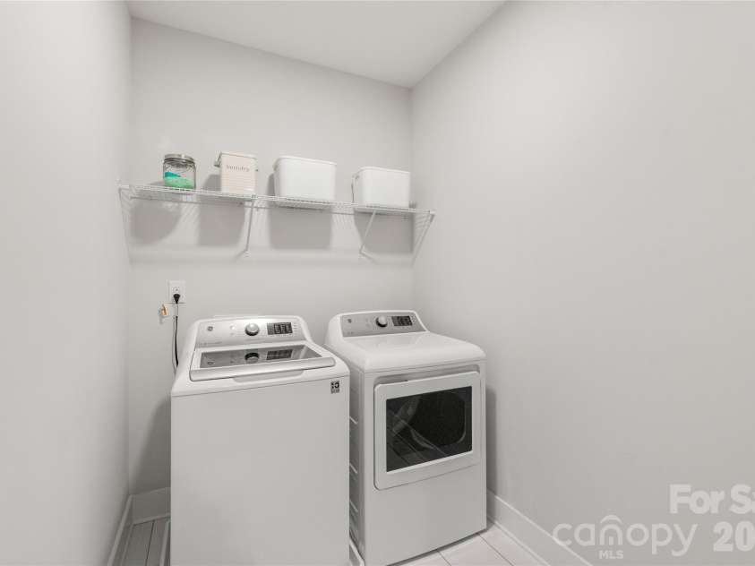 3437 Draper Avenue, Charlotte, NC 28205.  MLS# CAR4364902, YatesRealty ID 10915. More than just a space...this true walk-in laundry room offers ample space for folding and storage...plus washer and dryer convey!
