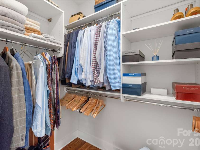 3437 Draper Avenue, Charlotte, NC 28205.  MLS# CAR4364902, YatesRealty ID 10915. No need to share closet space either. This first walk-in closet is a dream for organization, featuring custom built-ins designed to keep everything perfectly in its place.