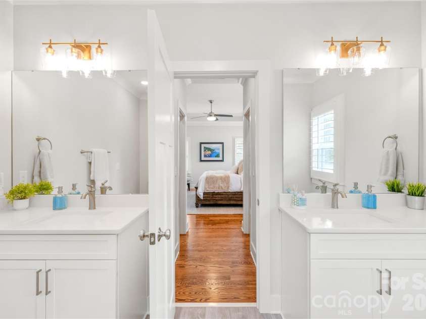 3437 Draper Avenue, Charlotte, NC 28205.  MLS# CAR4364902, YatesRealty ID 10915. Personal space, perfected. Dual separate vanities featuring custom designer lighting for the ultimate morning routine.