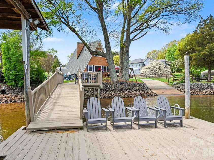 250 Ponderosa Circle, Mooresville, NC 28117.  MLS# CAR4364992, YatesRealty ID 10921. Relax on the large floating dock.