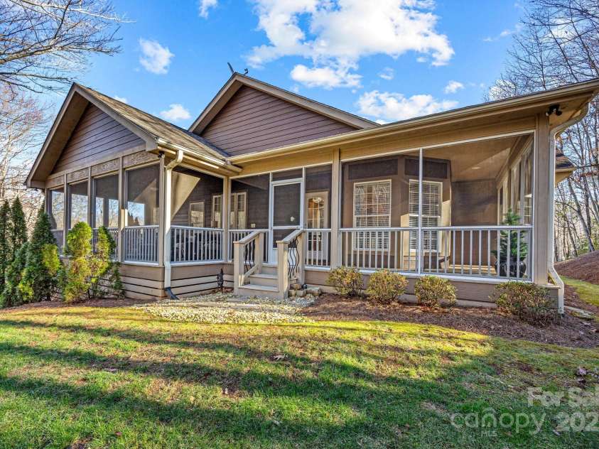 43 Smokemont Drive, Arden, NC 28704.  MLS# CAR4197497, YatesRealty ID 10921. Another angle of the back screened deck.