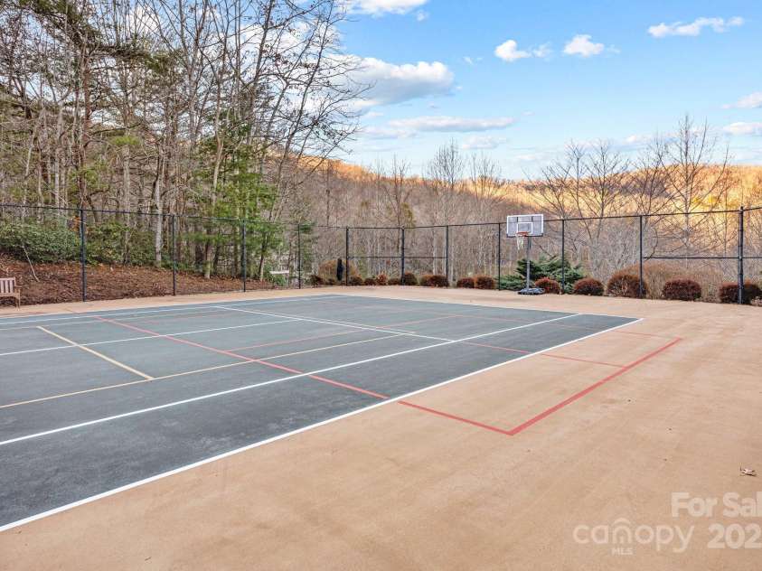 43 Smokemont Drive, Arden, NC 28704.  MLS# CAR4197497, YatesRealty ID 10921. Neighborhood tennis/pickleball court.