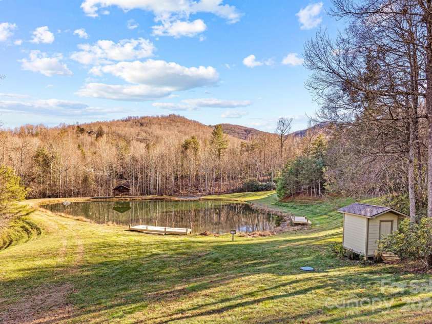 43 Smokemont Drive, Arden, NC 28704.  MLS# CAR4197497, YatesRealty ID 10921. Trout pond as seen from the house.