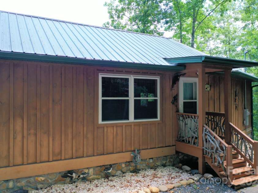 470 Bear Ridge Road, Tuckasegee, NC 28783.  MLS# CAR4159900, YatesRealty ID 10925. 