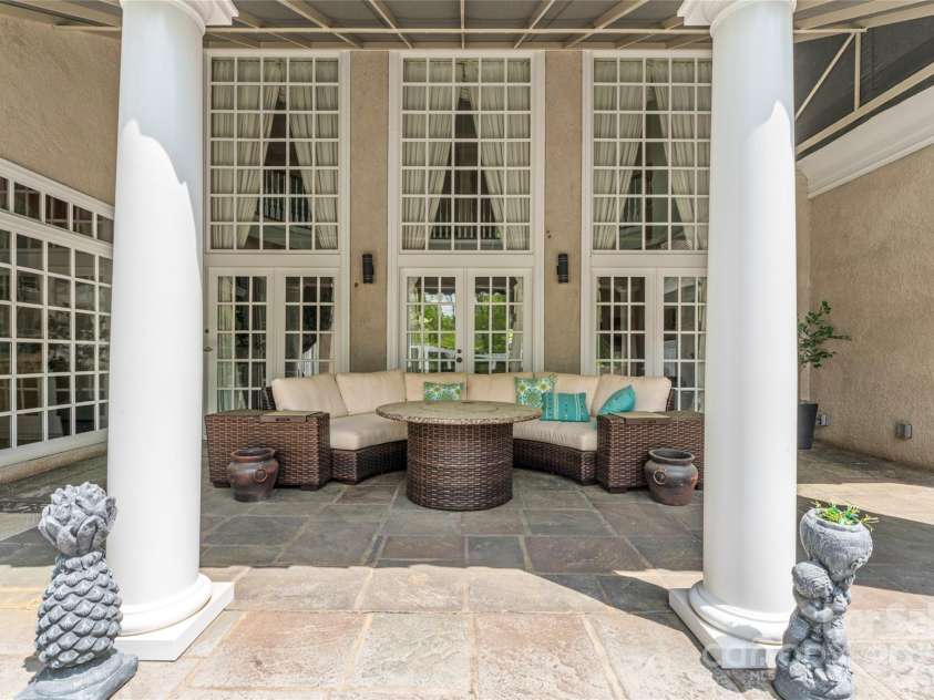 8934 Winged Bourne Drive, Charlotte, NC 28210.  MLS# CAR4245906, YatesRealty ID 10929. Covered sitting area with new canopy