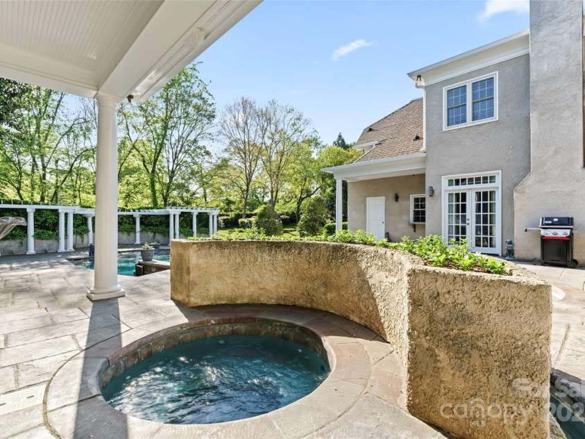 8934 Winged Bourne Drive, Charlotte, NC 28210.  MLS# CAR4245906, YatesRealty ID 10929. Walk out of the primary bedroom to this private oasis.
