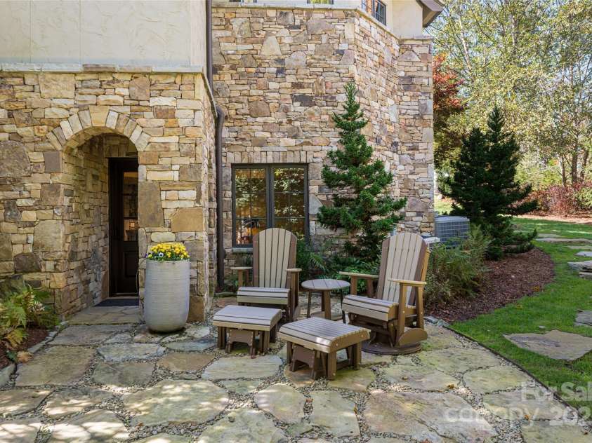 10 Fairsted Drive, Asheville, NC 28803.  MLS# CAR4307795, YatesRealty ID 1093. Private patio guest suite 