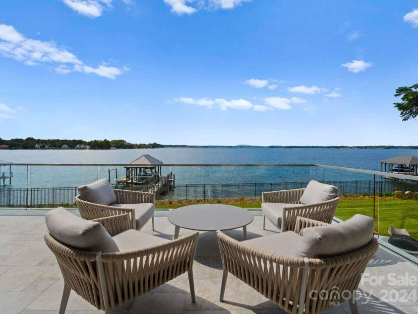 19125 Peninsula Point Drive, Cornelius, NC 28031.  MLS# CAR4180906, YatesRealty ID 1093. A Welcoming terrace with uninterrupted lake views.