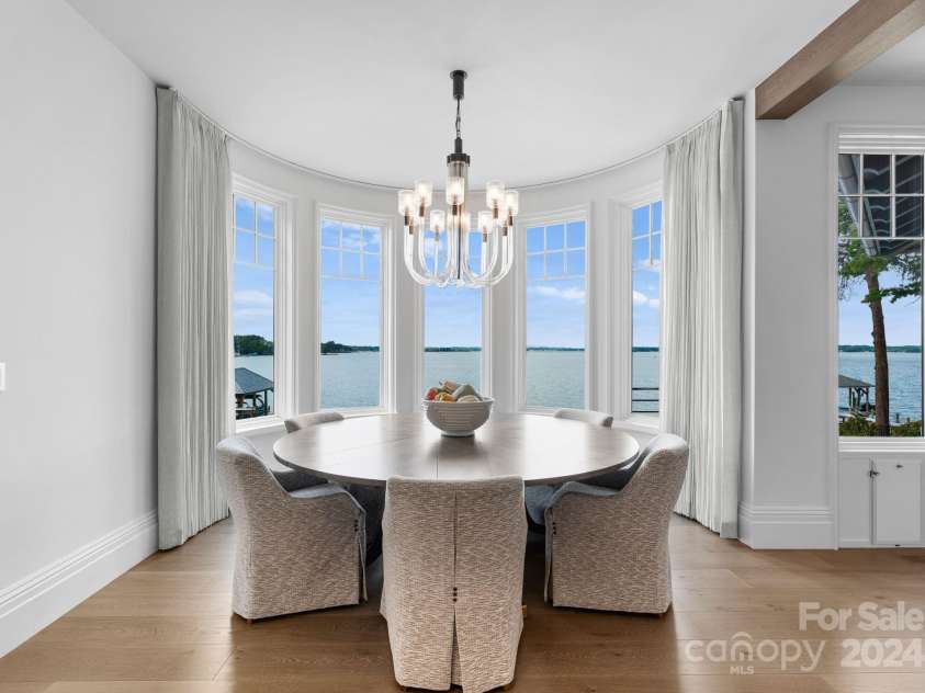 19125 Peninsula Point Drive, Cornelius, NC 28031.  MLS# CAR4180906, YatesRealty ID 1093. Dine in this gorgeous space overlooking the lake.