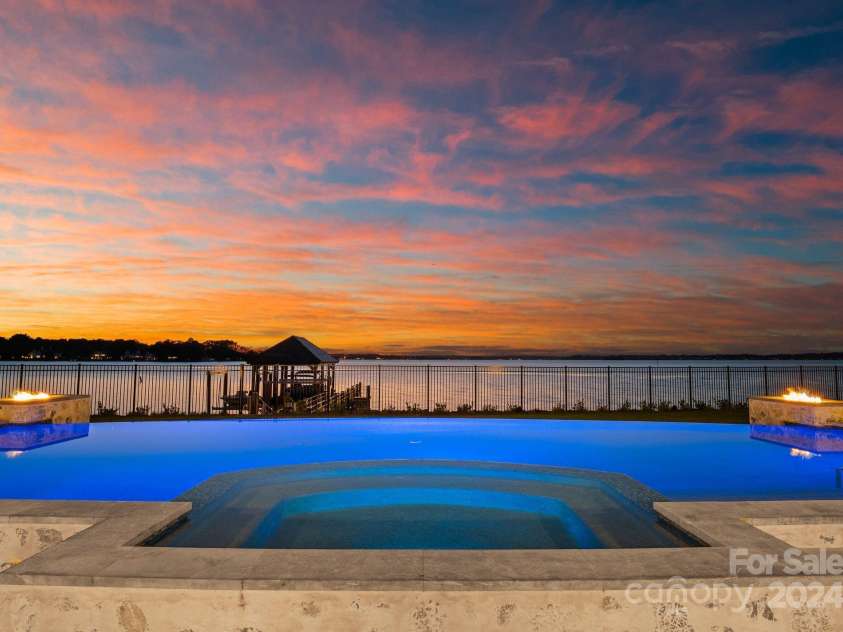 19125 Peninsula Point Drive, Cornelius, NC 28031.  MLS# CAR4180906, YatesRealty ID 1093. Resort worthy pool & spa.