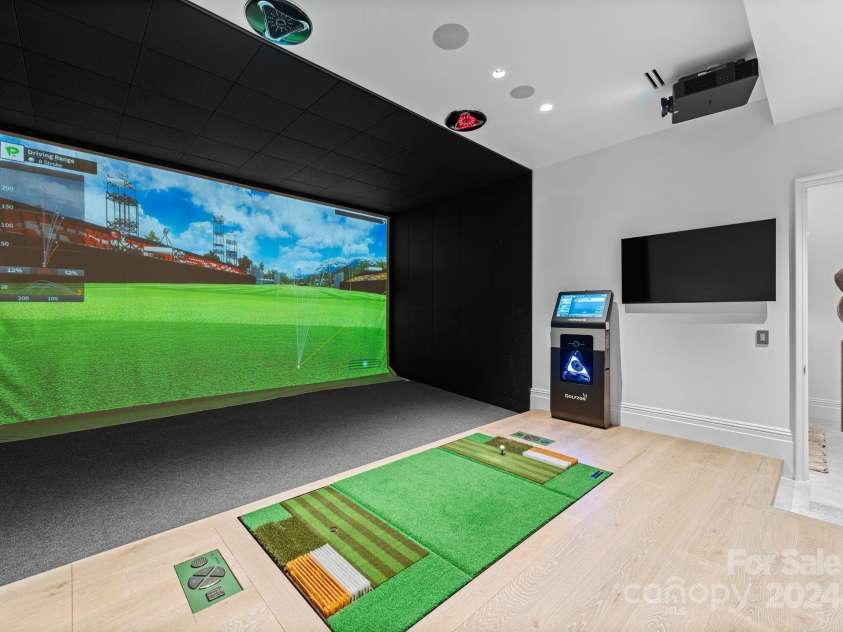 19125 Peninsula Point Drive, Cornelius, NC 28031.  MLS# CAR4180906, YatesRealty ID 1093. TWOVISION Plus golf simulator by Golfzon.