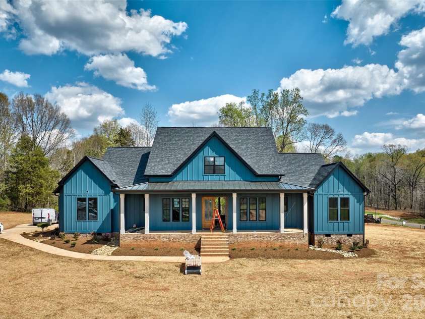 5104 Lowie Lane, Gastonia, NC 28056.  MLS# CAR4327132, YatesRealty ID 10932. Front elevation of home