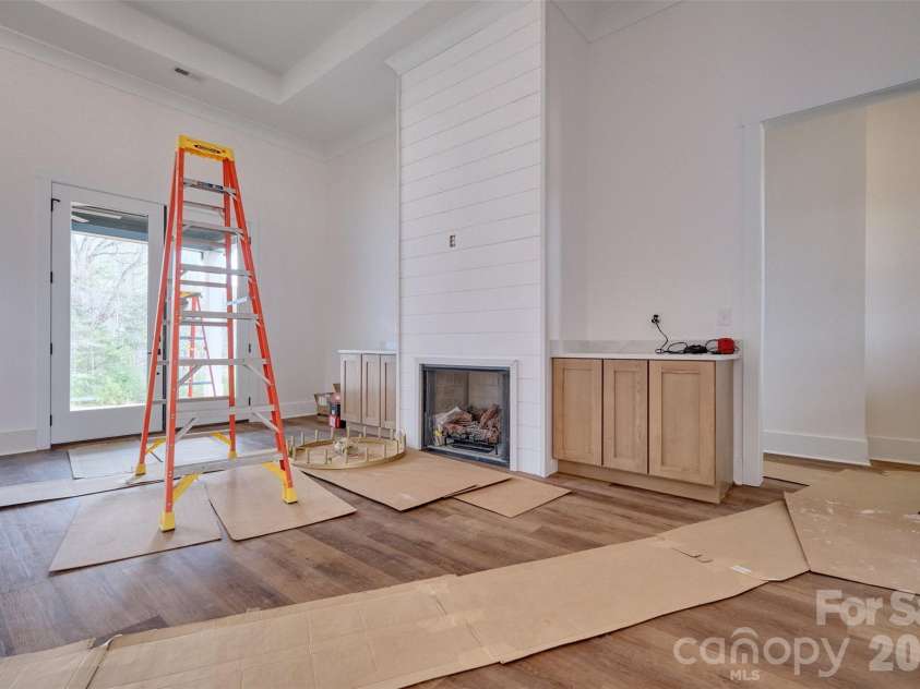 5104 Lowie Lane, Gastonia, NC 28056.  MLS# CAR4327132, YatesRealty ID 10932. Great room with fireplace