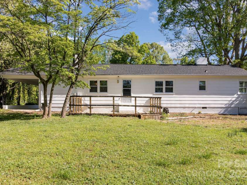 706 Lowell Avenue, Lowell, NC 28098.  MLS# CAR4243379, YatesRealty ID 10935. Backyard