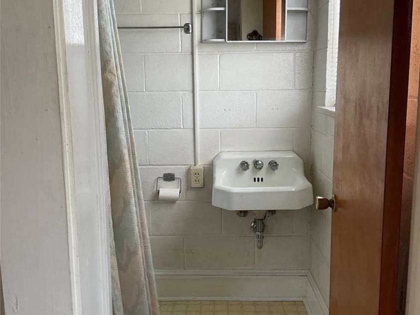219 Central Avenue, Locust, NC 28097.  MLS# CAR4368249, YatesRealty ID 10940. Basement full bath