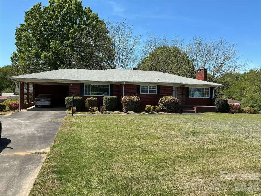219 Central Avenue, Locust, NC 28097.  MLS# CAR4368249, YatesRealty ID 10940. Front of home