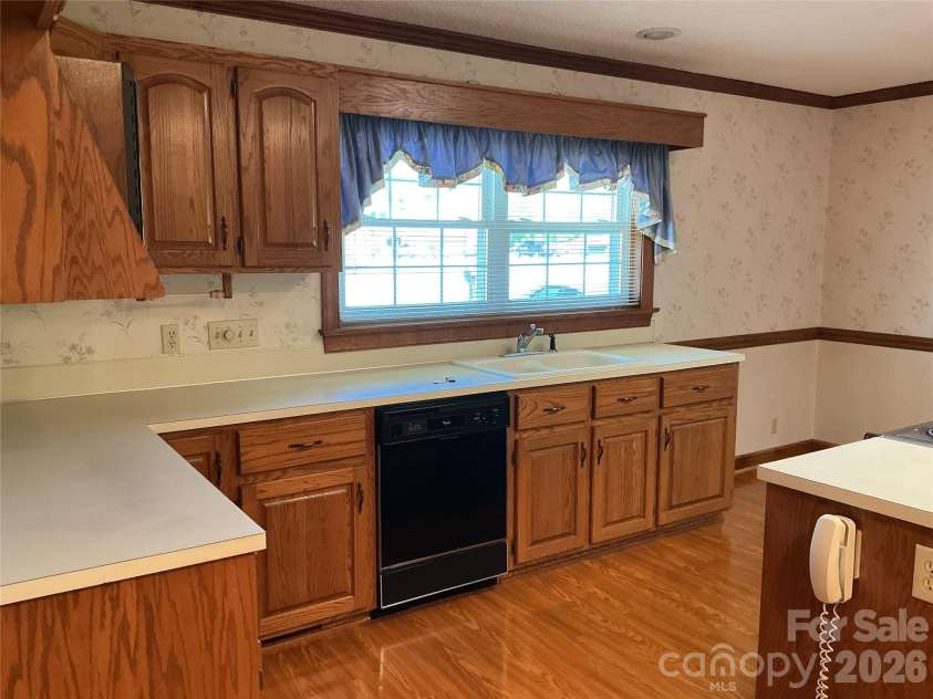219 Central Avenue, Locust, NC 28097.  MLS# CAR4368249, YatesRealty ID 10940. Kitchen