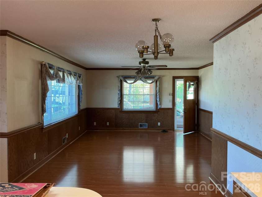219 Central Avenue, Locust, NC 28097.  MLS# CAR4368249, YatesRealty ID 10940. Living room