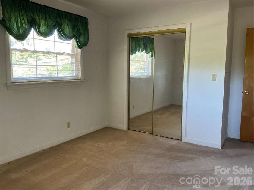 219 Central Avenue, Locust, NC 28097.  MLS# CAR4368249, YatesRealty ID 10940. Second bedroom