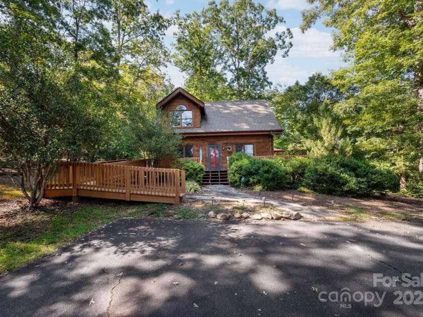 117 Laurel Lakes Parkway, Lake Lure, NC 28746.  MLS# CAR4182403, YatesRealty ID 10954. Front of cabin
