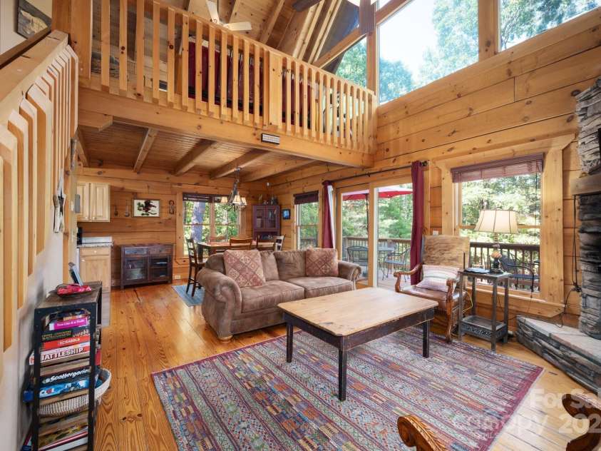 117 Laurel Lakes Parkway, Lake Lure, NC 28746.  MLS# CAR4182403, YatesRealty ID 10954. Living room and loft