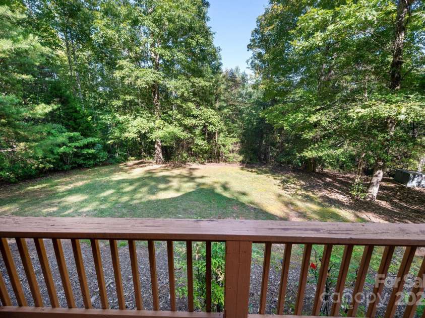 117 Laurel Lakes Parkway, Lake Lure, NC 28746.  MLS# CAR4182403, YatesRealty ID 10954. Side yard