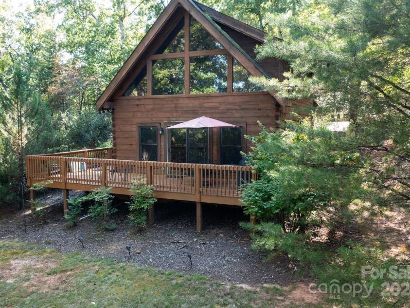 117 Laurel Lakes Parkway, Lake Lure, NC 28746.  MLS# CAR4182403, YatesRealty ID 10954. Side yard