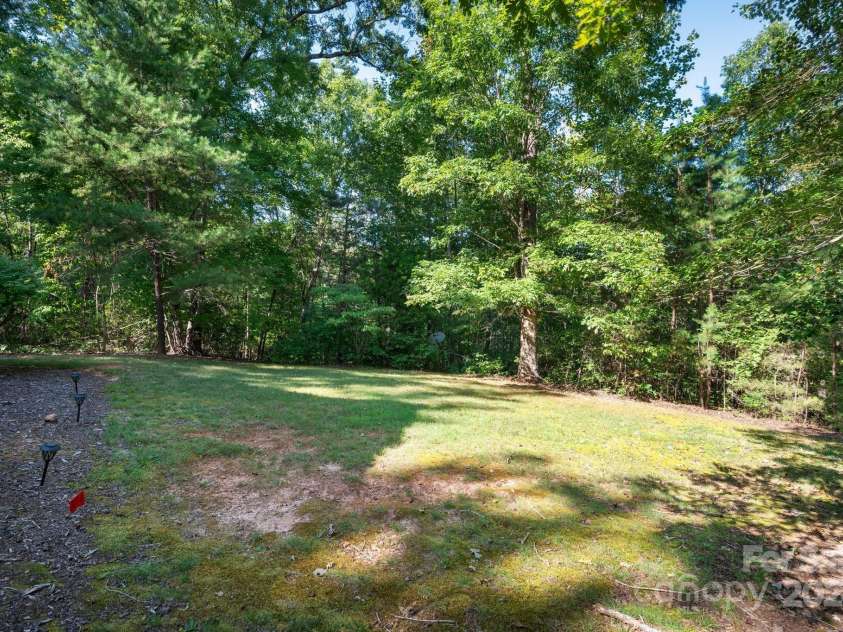 117 Laurel Lakes Parkway, Lake Lure, NC 28746.  MLS# CAR4182403, YatesRealty ID 10954. Yard