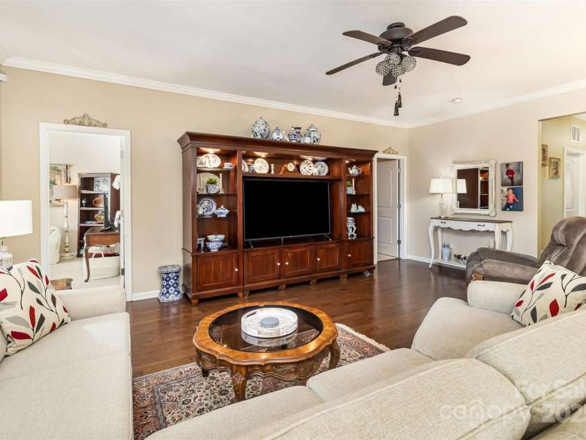 116 Water Ski Drive, Statesville, NC 28677.  MLS# CAR4239972, YatesRealty ID 10957. View of living room from the breakfast area.