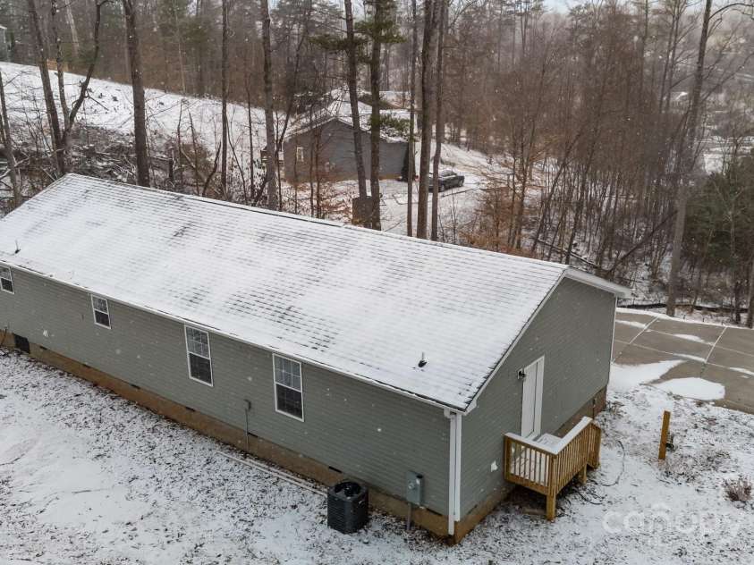 15 Luther Woods Drive, Candler, NC 28715.  MLS# CAR4225805, YatesRealty ID 10958. 