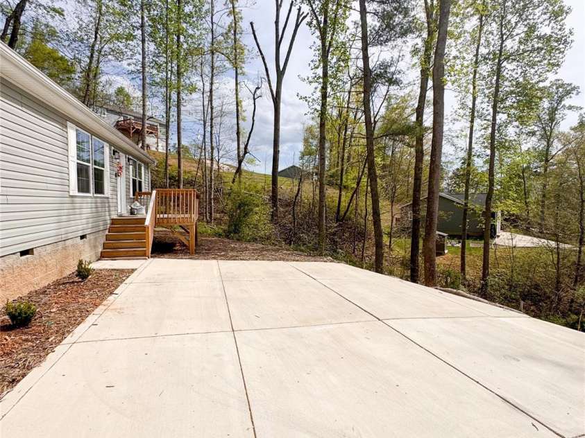 15 Luther Woods Drive, Candler, NC 28715.  MLS# CAR4225805, YatesRealty ID 10958. 