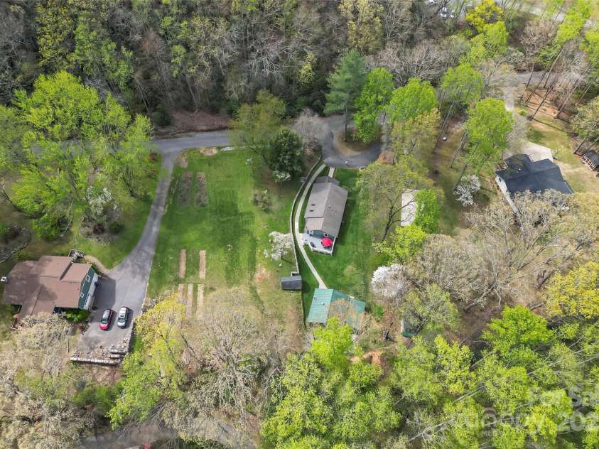 11 Hunting Lodge Drive, Black Mountain, NC 28711.  MLS# CAR4244815, YatesRealty ID 10963. Aerial view of expansive lot - amazing space!