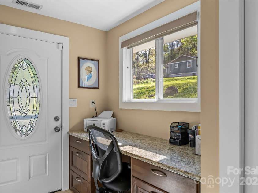 11 Hunting Lodge Drive, Black Mountain, NC 28711.  MLS# CAR4244815, YatesRealty ID 10963. Built-in desk for extra convenience.