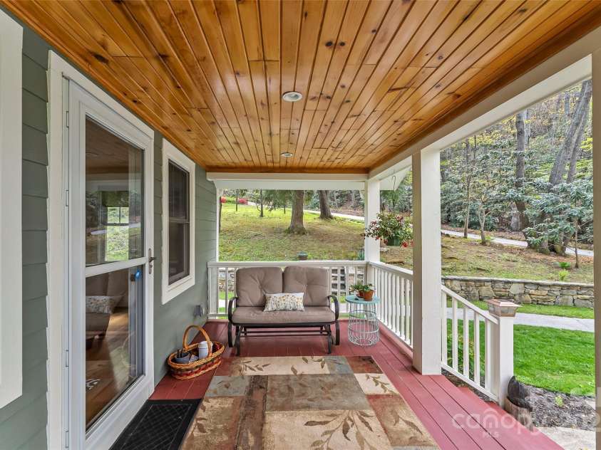 11 Hunting Lodge Drive, Black Mountain, NC 28711.  MLS# CAR4244815, YatesRealty ID 10963. Front covered porch is dreamy!