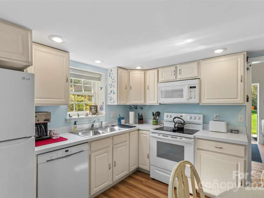 11 Hunting Lodge Drive, Black Mountain, NC 28711.  MLS# CAR4244815, YatesRealty ID 10963. Guest house kitchen - plenty of space to cook and enjoy!