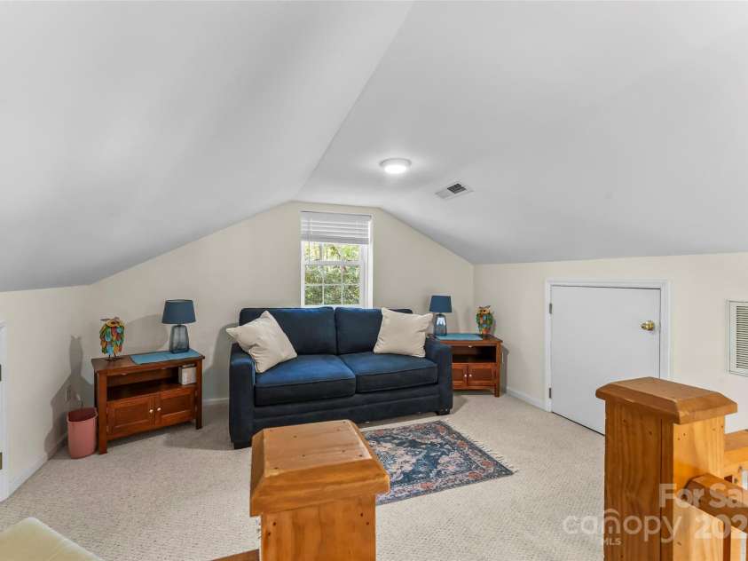 11 Hunting Lodge Drive, Black Mountain, NC 28711.  MLS# CAR4244815, YatesRealty ID 10963. Loft in guest house