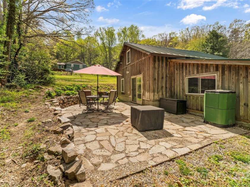 11 Hunting Lodge Drive, Black Mountain, NC 28711.  MLS# CAR4244815, YatesRealty ID 10963. Spacious back patio of guest house