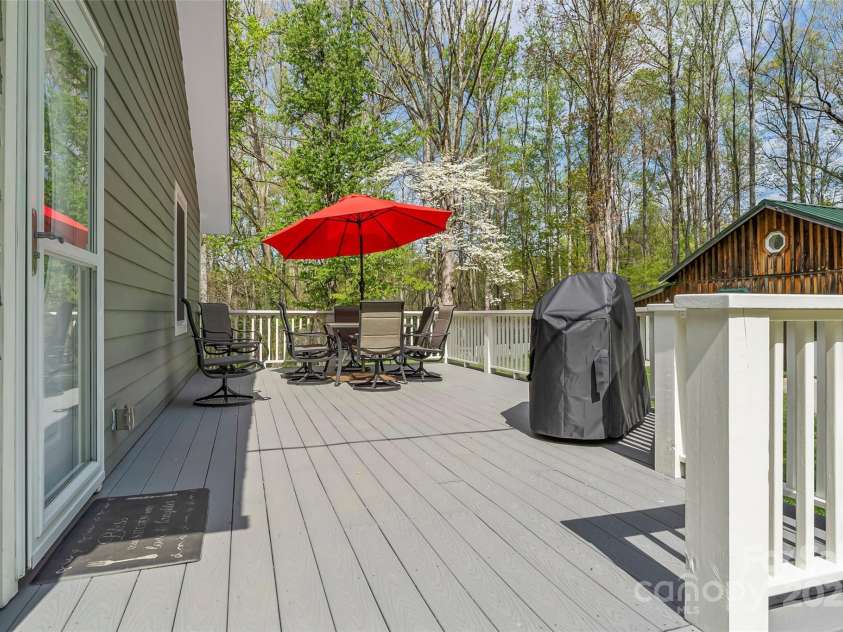 11 Hunting Lodge Drive, Black Mountain, NC 28711.  MLS# CAR4244815, YatesRealty ID 10963. Trex decking creates amazing outdoor space!