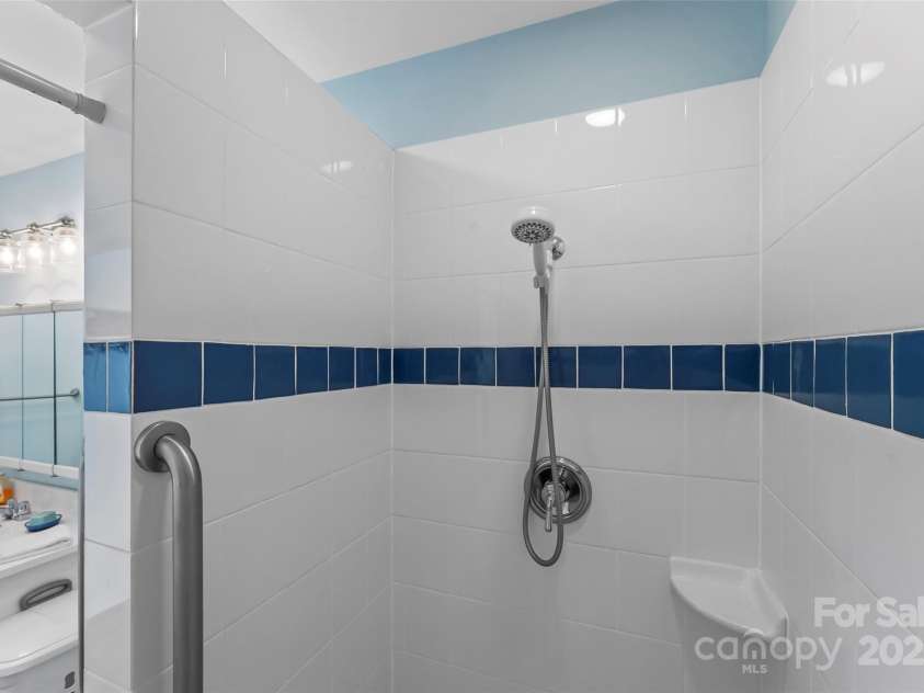 11 Hunting Lodge Drive, Black Mountain, NC 28711.  MLS# CAR4244815, YatesRealty ID 10963. Updated guest house bathroom