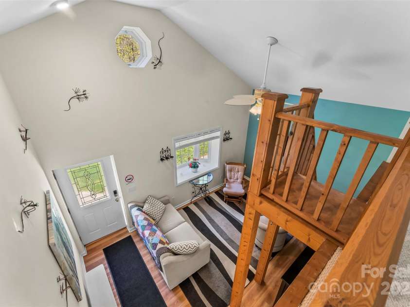 11 Hunting Lodge Drive, Black Mountain, NC 28711.  MLS# CAR4244815, YatesRealty ID 10963. View from loft in guest house