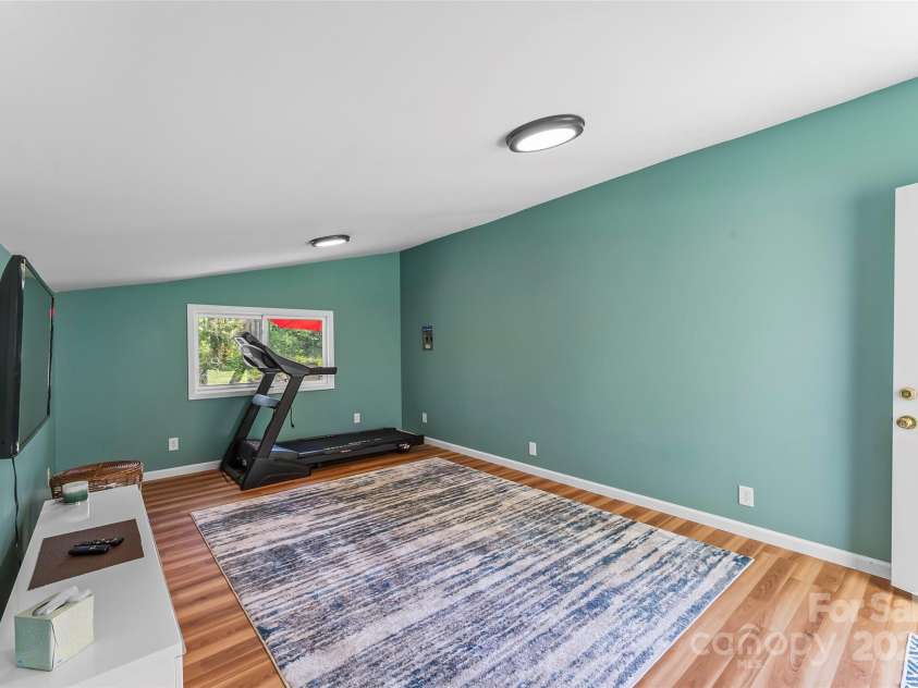 11 Hunting Lodge Drive, Black Mountain, NC 28711.  MLS# CAR4244815, YatesRealty ID 10963. Yoga studio w/ private entrance - great flex space!