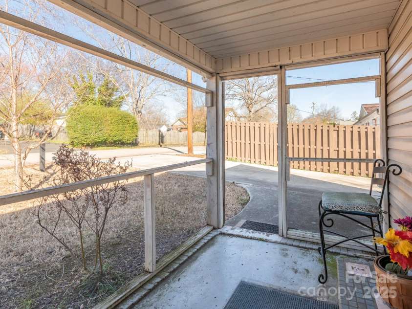 707 Oakshade Avenue, Kannapolis, NC 28083.  MLS# CAR4233464, YatesRealty ID 10971. Front covered patio
