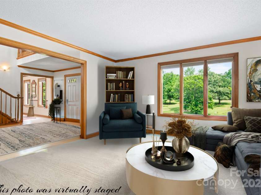 4299 Randleman Road, Iron Station, NC 28080.  MLS# CAR4159098, YatesRealty ID 10975. Secondary living space adjacent to great room. Allows for large gatherings and lots of room for people to move around easily