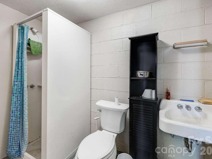 254 Orchard Circle, Laurel Park, NC 28739.  MLS# CAR4363320, YatesRealty ID 10980. Basement bathroom